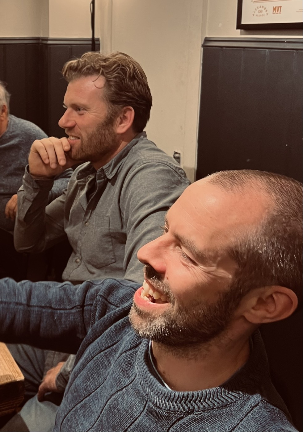 Men Talk Music members laughing together at a meetup